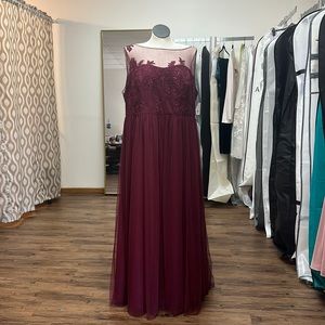 Brand new with tags. David’s Bridal Dress Size 24